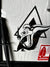 Black and white graphic of the ARES WORK skunk character with an ARES arrow triangle outline on a white background
